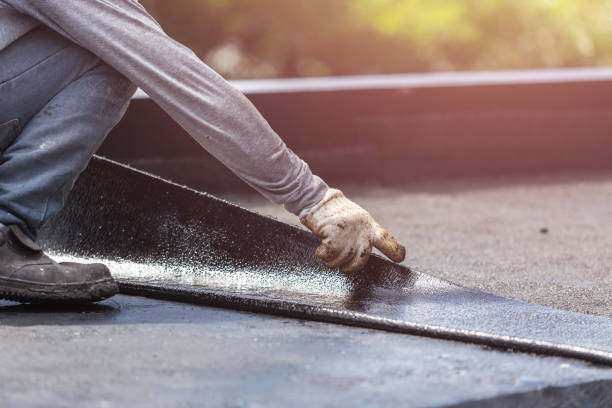 Professional Waterproofing technician working in Tustin, MI